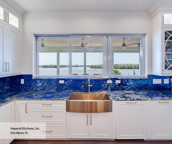 Coastal Luxe Kitchen with White Shaker Cabinets and Blue Quartzite Island