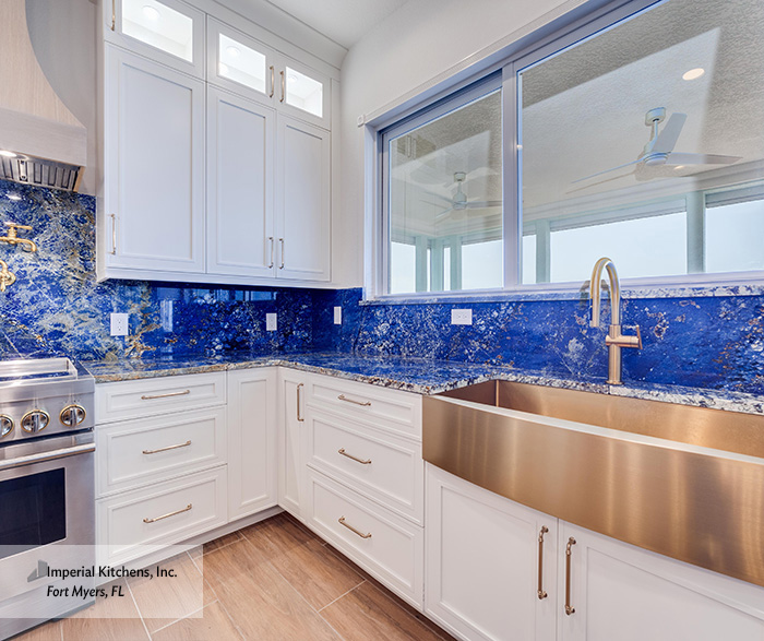 Coastal Luxe Kitchen with White Shaker Cabinets and Blue Quartzite Island